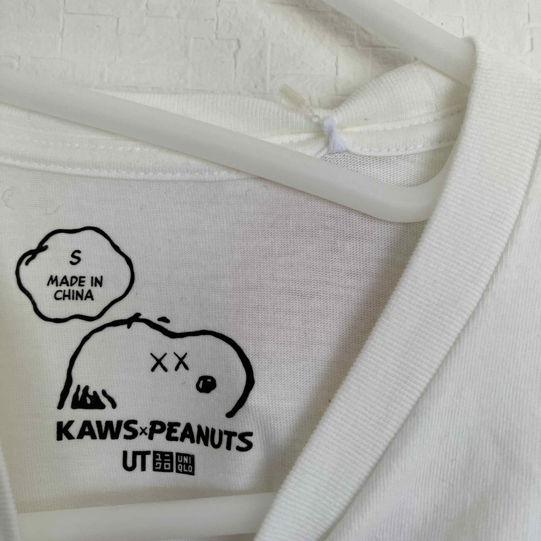 UNIQLO(ユニクロ)の新品未使用　カウズ　KAWS ×PEANUTS×ユニクロ　ウッドストック レディースのトップス(Tシャツ(半袖/袖なし))の商品写真