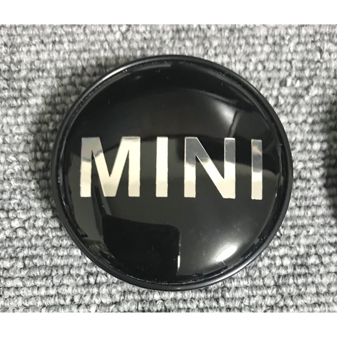 ミニ(ミニ)のミニクーパー　MINIホイールセンターキャップ　R系　54mm 4個　ブラック  自動車/バイクの自動車(車外アクセサリ)の商品写真