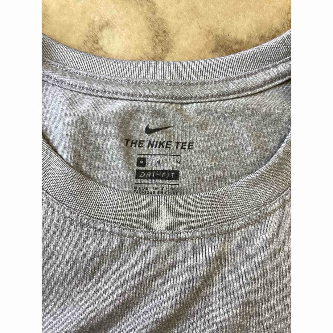 NIKE(ナイキ)のナイキ　Tシャツ　レディース　Mサイズ スポーツ/アウトドアのトレーニング/エクササイズ(その他)の商品写真