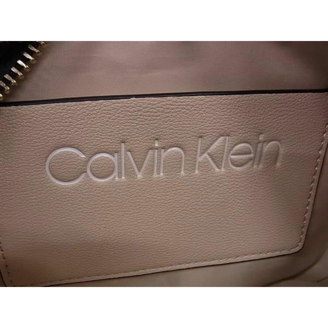 Calvin Klein(カルバンクライン)の■新品■未使用■ Calvin Klein カルバンクライン レザー 総柄 ショルダーバッグ クロスボディ ポシェット ブラウン系 BJ2495 レディースのアクセサリー(その他)の商品写真