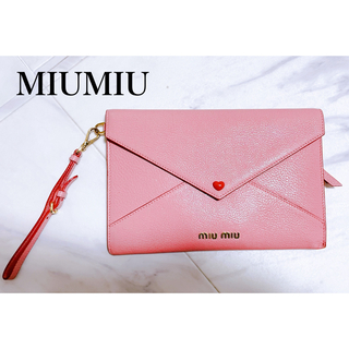ミュウミュウ(miumiu)のMIUMIU miumiu ミュウミュウ マルチケース 財布 ピンク(財布)