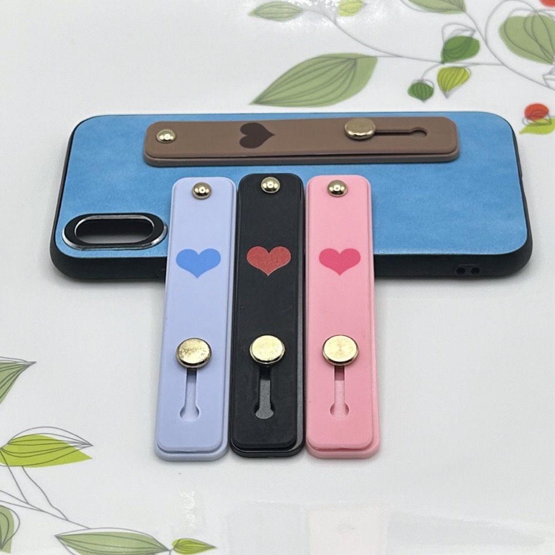 スマホベルト(ハート柄) スマホバンド　スマホケースに貼る　落下防止　 スマホ/家電/カメラのスマホアクセサリー(その他)の商品写真