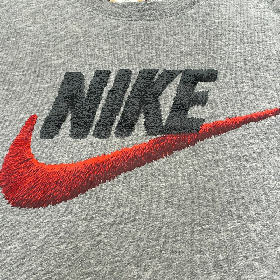 NIKE(ナイキ)の古着　NIKE　Tシャツ レディースのトップス(Tシャツ(半袖/袖なし))の商品写真