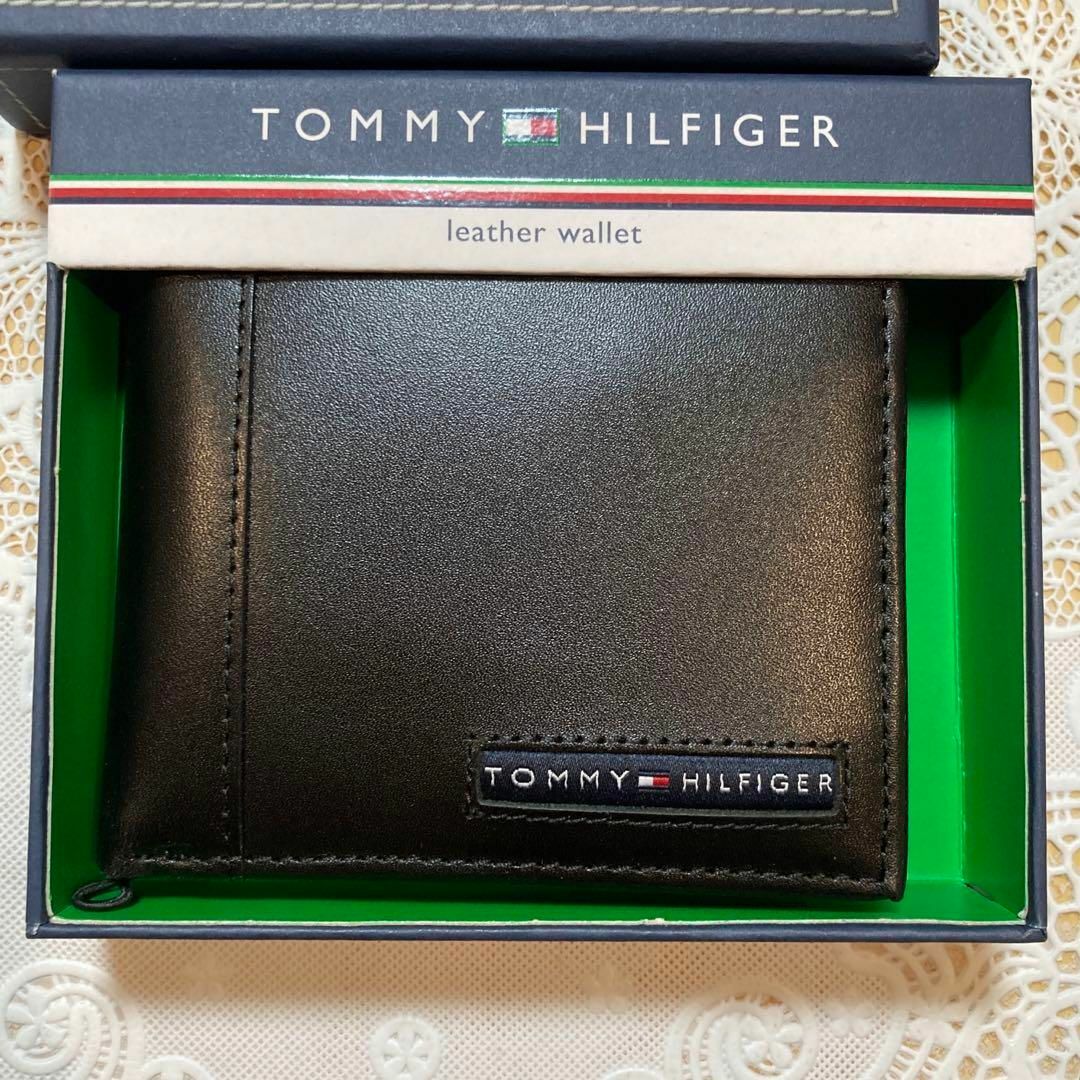 TOMMY HILFIGER(トミーヒルフィガー)のトミーフィルフィガー　二つ折り財布 メンズのファッション小物(折り財布)の商品写真