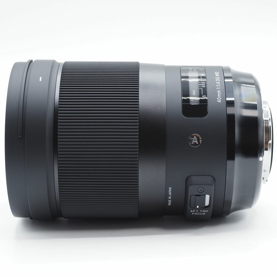 ★新品級・フード付き★ SIGMA シグマ 40mm F1.4 DG HSM スマホ/家電/カメラのカメラ(レンズ(単焦点))の商品写真