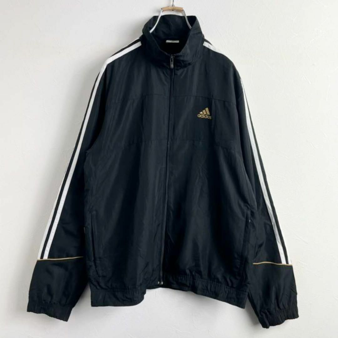 adidas(アディダス)のアディダス　ワンポイントロゴ　3ライン　黒　ナイロンジャケット　ジャージ メンズのジャケット/アウター(ナイロンジャケット)の商品写真