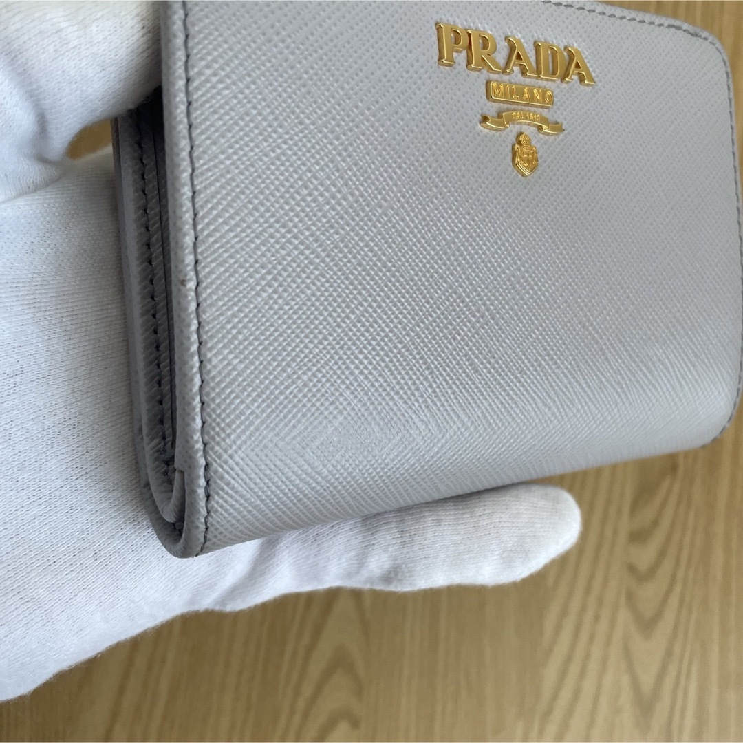 PRADA(プラダ)の新作 132000円　極美品　PRADA プラダ　マルチカラー　二つ折り財布　紫 レディースのファッション小物(財布)の商品写真