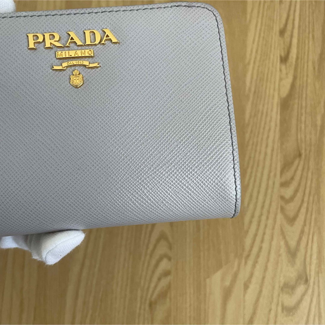 PRADA(プラダ)の新作 132000円　極美品　PRADA プラダ　マルチカラー　二つ折り財布　紫 レディースのファッション小物(財布)の商品写真