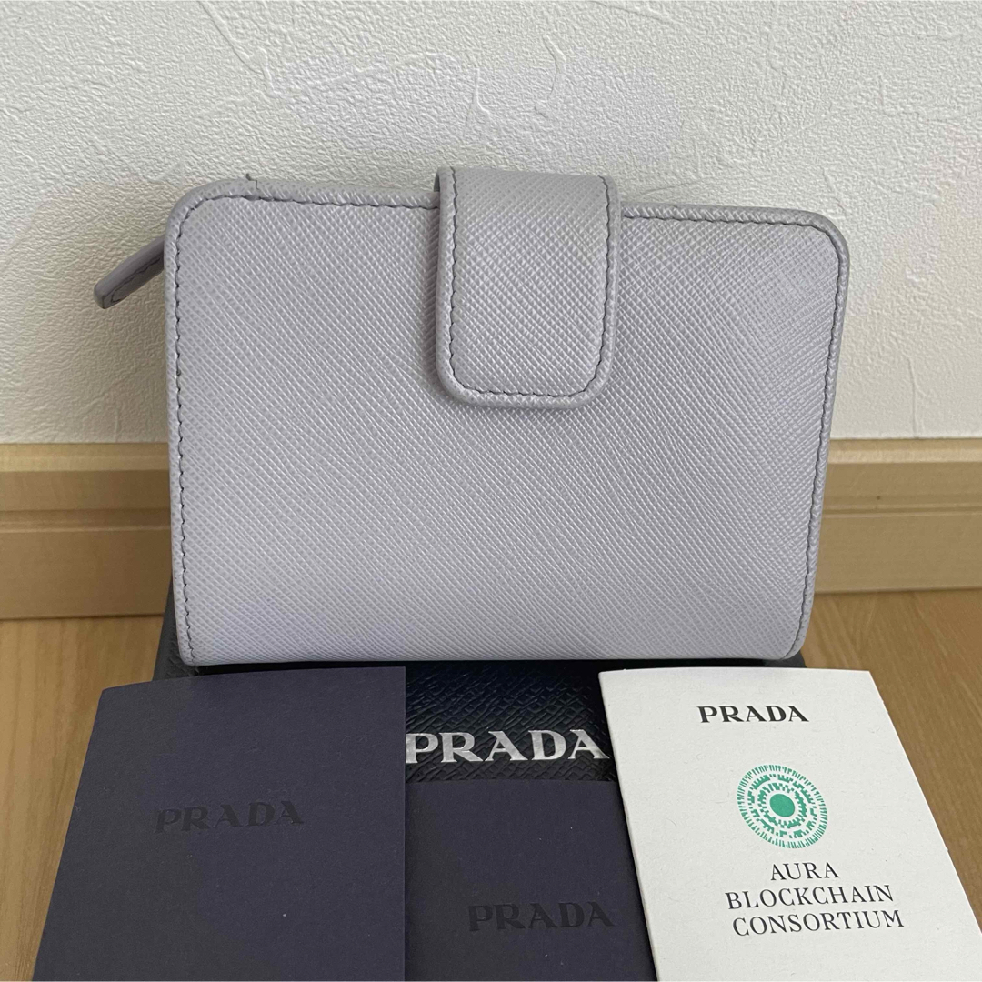 PRADA(プラダ)の新作 132000円　極美品　PRADA プラダ　マルチカラー　二つ折り財布　紫 レディースのファッション小物(財布)の商品写真