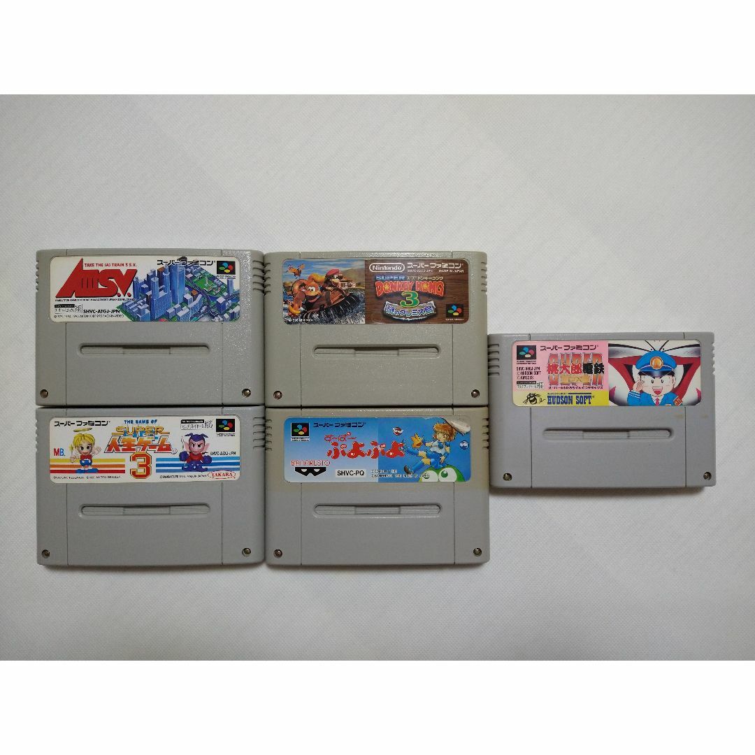 スーパーファミコン(スーパーファミコン)の【SFC】５本セット　A列車、人生ゲーム、ドンキーコング、ぷよぷよ、桃鉄 エンタメ/ホビーのゲームソフト/ゲーム機本体(家庭用ゲームソフト)の商品写真