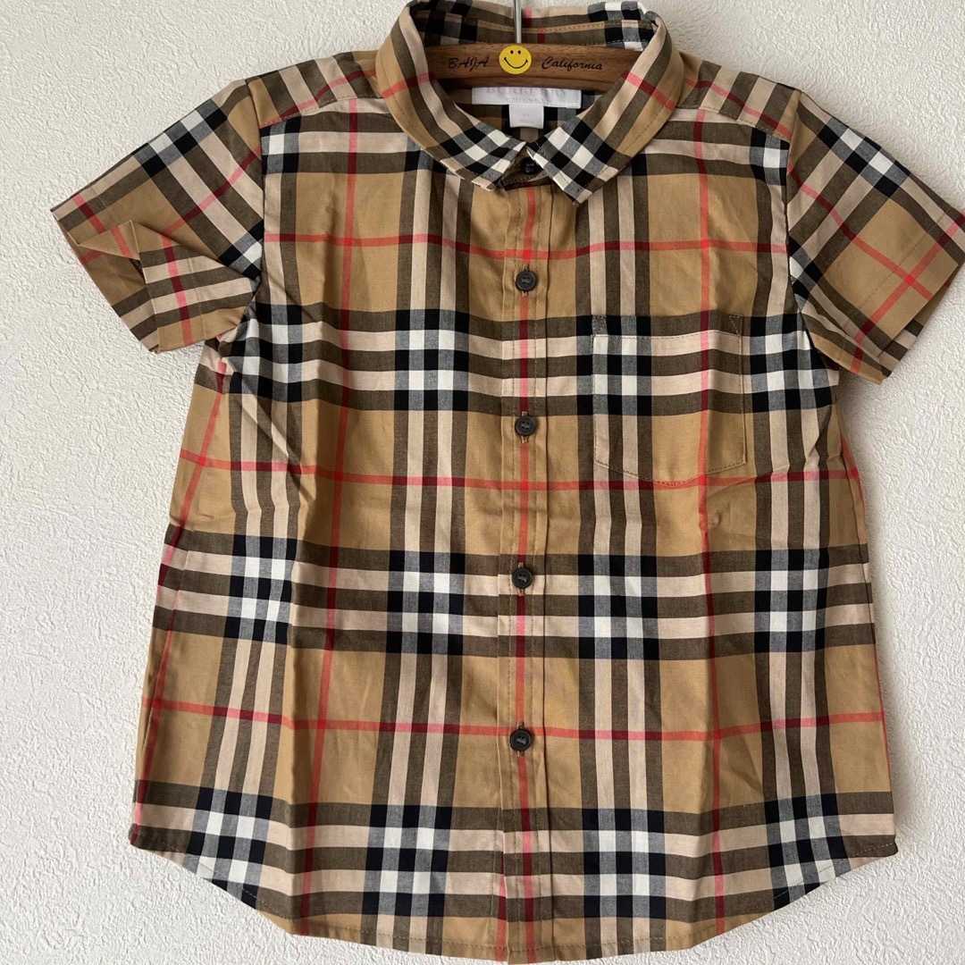 BURBERRY(バーバリー)の新品タグ付きBURBERRYチェック半袖シャツ キッズ/ベビー/マタニティのキッズ服女の子用(90cm~)(ブラウス)の商品写真