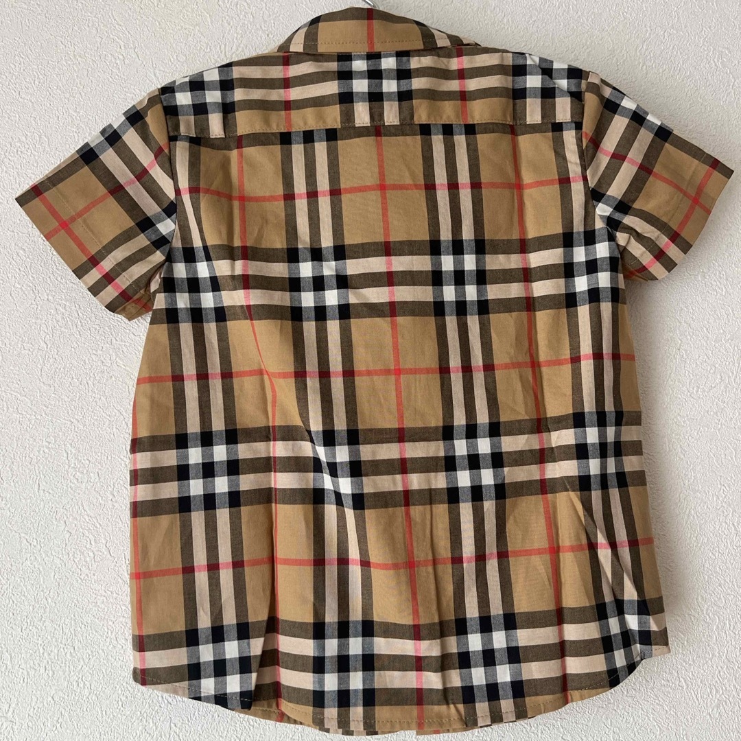 BURBERRY(バーバリー)の新品タグ付きBURBERRYチェック半袖シャツ キッズ/ベビー/マタニティのキッズ服女の子用(90cm~)(ブラウス)の商品写真