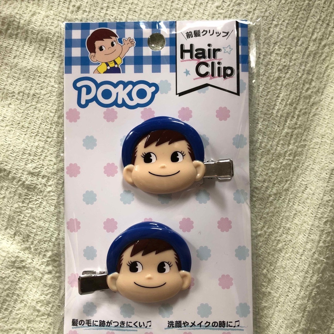 不二家(フジヤ)の新品　未開封　ポコちゃん　前髪クリップ　ペコちゃん レディースのヘアアクセサリー(バレッタ/ヘアクリップ)の商品写真