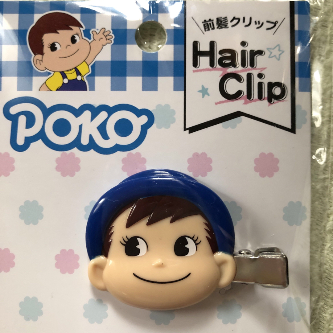 不二家(フジヤ)の新品　未開封　ポコちゃん　前髪クリップ　ペコちゃん レディースのヘアアクセサリー(バレッタ/ヘアクリップ)の商品写真