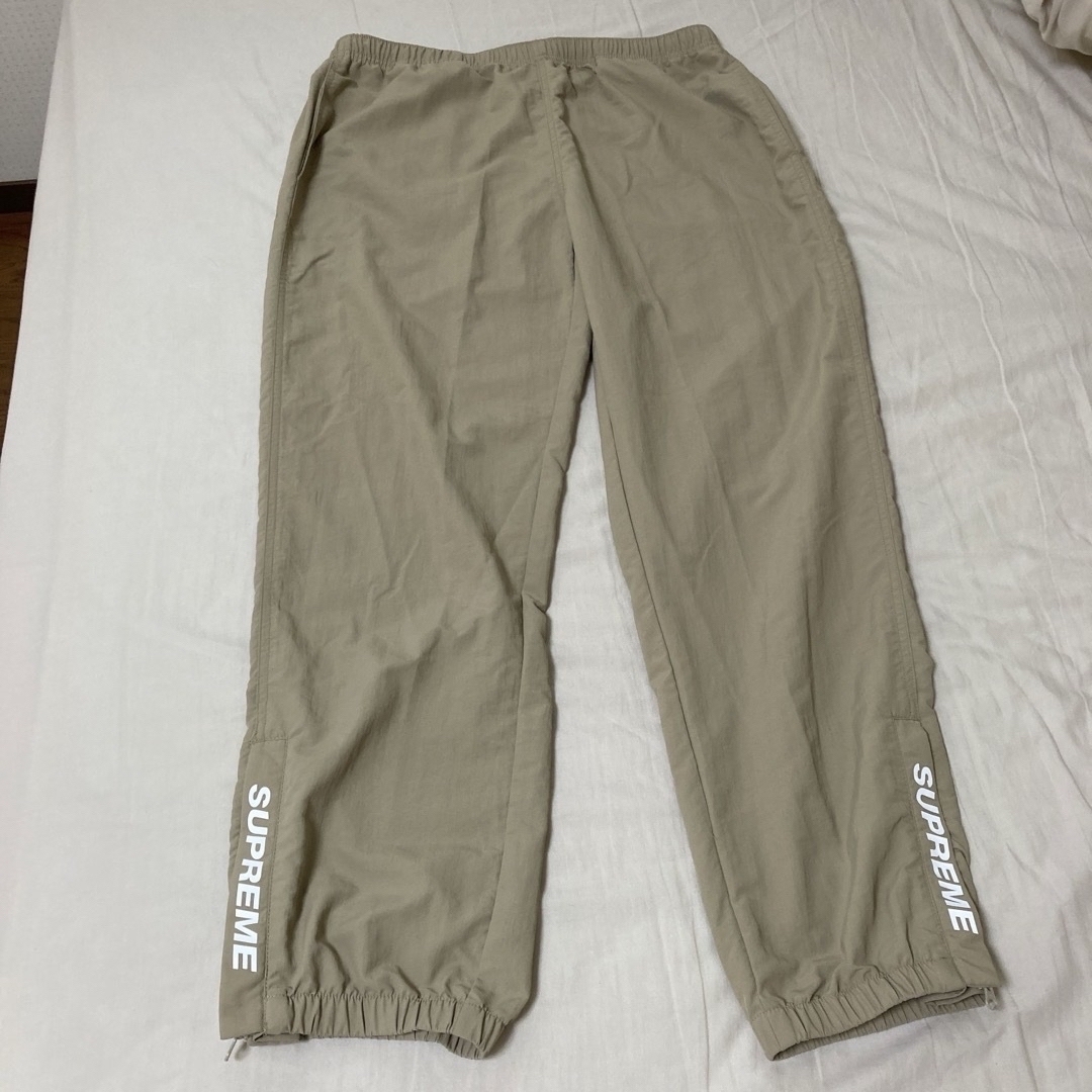 Supreme(シュプリーム)のSUPREME WARM UP PANT pants ナイロンパンツ メンズのパンツ(その他)の商品写真