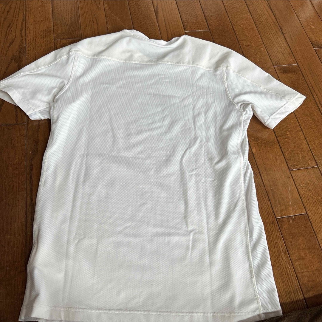 NIKE(ナイキ)のナイキ　ドライフット　Tシャツ　白　レディースサイズL レディースのトップス(Tシャツ(長袖/七分))の商品写真