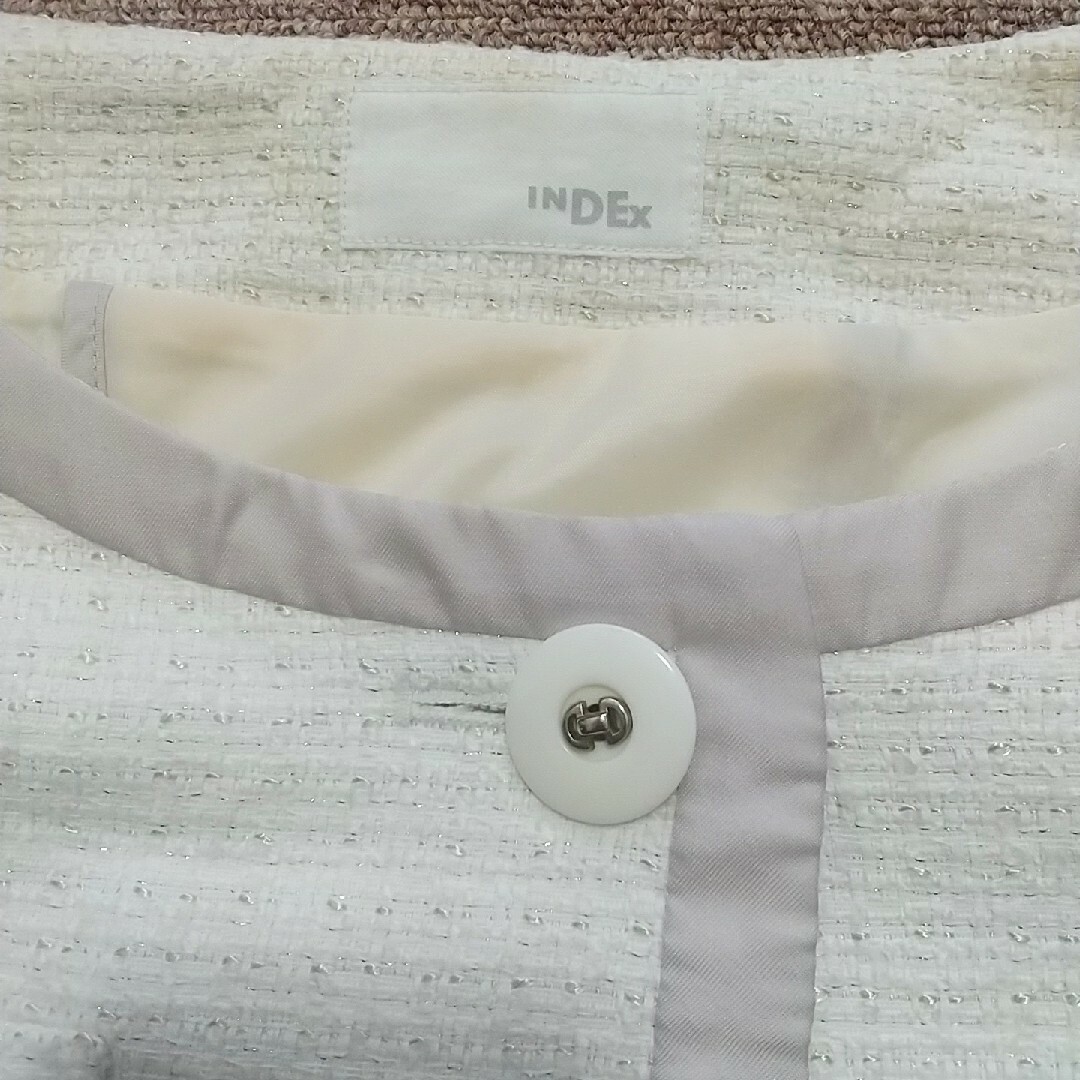 INDEX(インデックス)のindex ツイード調　ノーカラージャケット　七分袖　白 レディースのジャケット/アウター(ノーカラージャケット)の商品写真