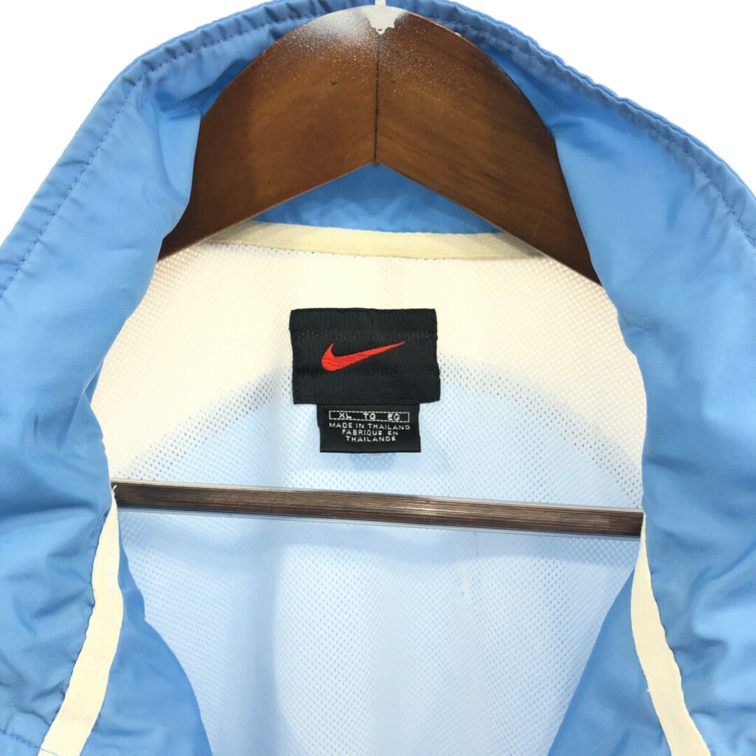NIKE(ナイキ)の90年代 NIKE ナイキ ナイロン トラックジャケット スポーツ ライトブルー (メンズ XL) 中古 古着 Q4639 メンズのジャケット/アウター(その他)の商品写真