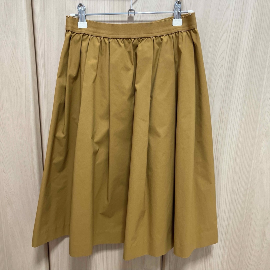 UNIQLO(ユニクロ)のユニクロ　フレアスカート　黄色　イエロー レディースのスカート(ひざ丈スカート)の商品写真