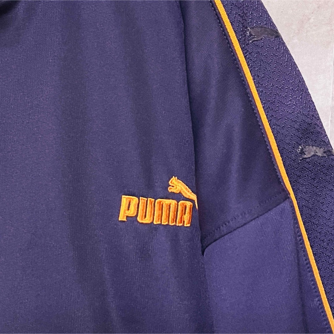 PUMA(プーマ)のPUMAジャージ上　トラックジャケット　M 刺繍ロゴ　袖ロゴ　パープル×オレンジ メンズのトップス(ジャージ)の商品写真