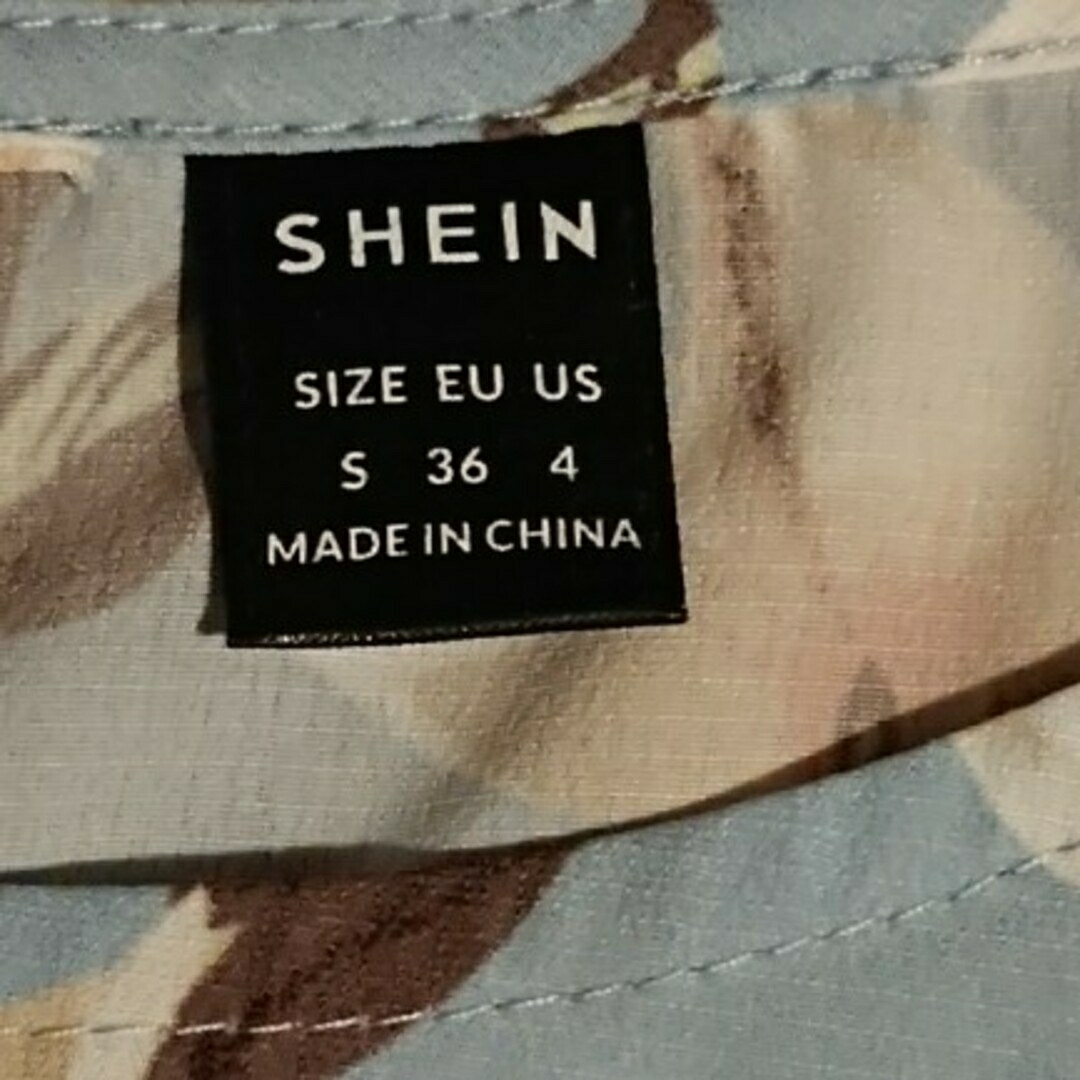 SHEIN(シーイン)のSHEIN マタニティオールオーバーフローラルプリントプリーツヘムベルトドレス レディースのワンピース(ロングワンピース/マキシワンピース)の商品写真