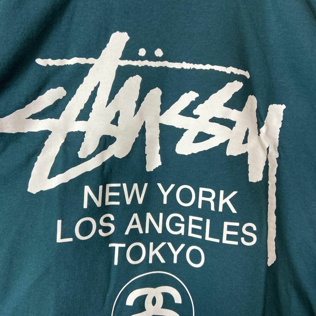 STUSSY(ステューシー)の【タグ付き、ワールドツアー】stussy両面プリントロゴTシャツ緑ストリートM メンズのトップス(Tシャツ/カットソー(半袖/袖なし))の商品写真