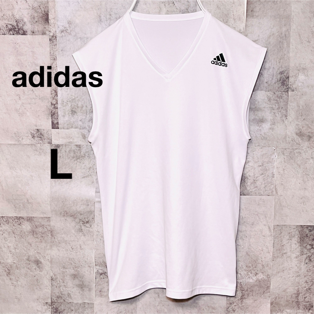 adidas(アディダス)のアディダスタンクトップ　ノースリーブ　L 胸ロゴ　ホワイト メンズのトップス(Tシャツ/カットソー(半袖/袖なし))の商品写真