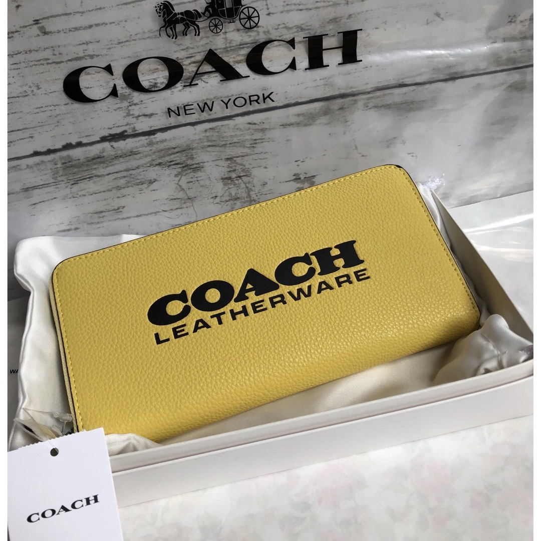 COACH(コーチ)の新品未使用　COACHコーチ  レディース　メンズ長財布　ロゴ入り　イエロー レディースのファッション小物(財布)の商品写真