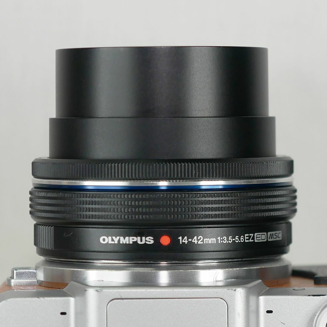 OLYMPUS(オリンパス)のオリンパス 電動パンケーキレンズ M.ZUIKO 14-42mm ブラック スマホ/家電/カメラのカメラ(レンズ(ズーム))の商品写真