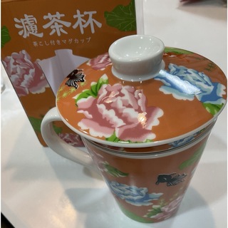 カルディ(KALDI)の茶こし付きマグカップ（アプリコット）(グラス/カップ)