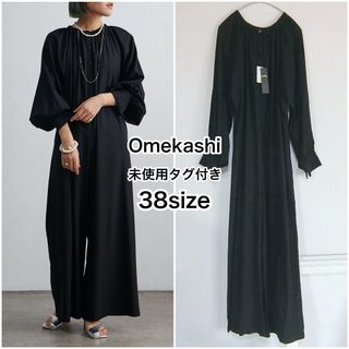 Omekashi - 未使用タグ付　omekashi　38サイズ　黒　シャーリングネックオールインワン