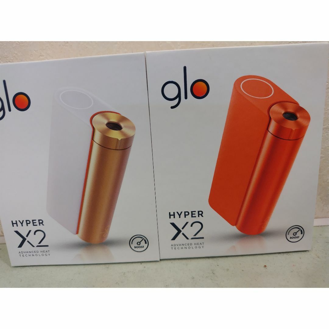 glo(グロー)のglo hyper X2 メタルオレンジとホワイトゴールドのセット　新品未開封 メンズのファッション小物(タバコグッズ)の商品写真