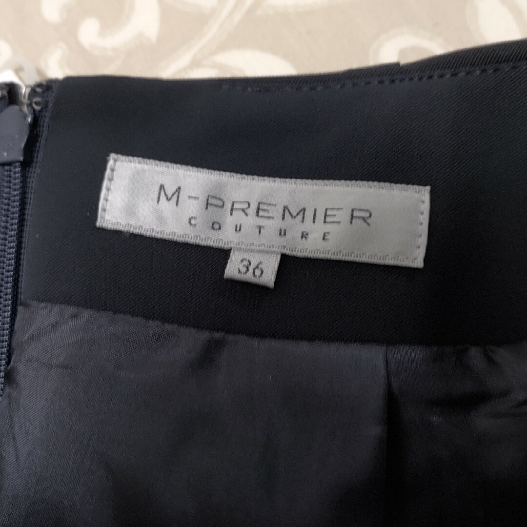 M-premier(エムプルミエ)のM-PREMIER COUTURE タックフレアースカート レディースのスカート(ひざ丈スカート)の商品写真