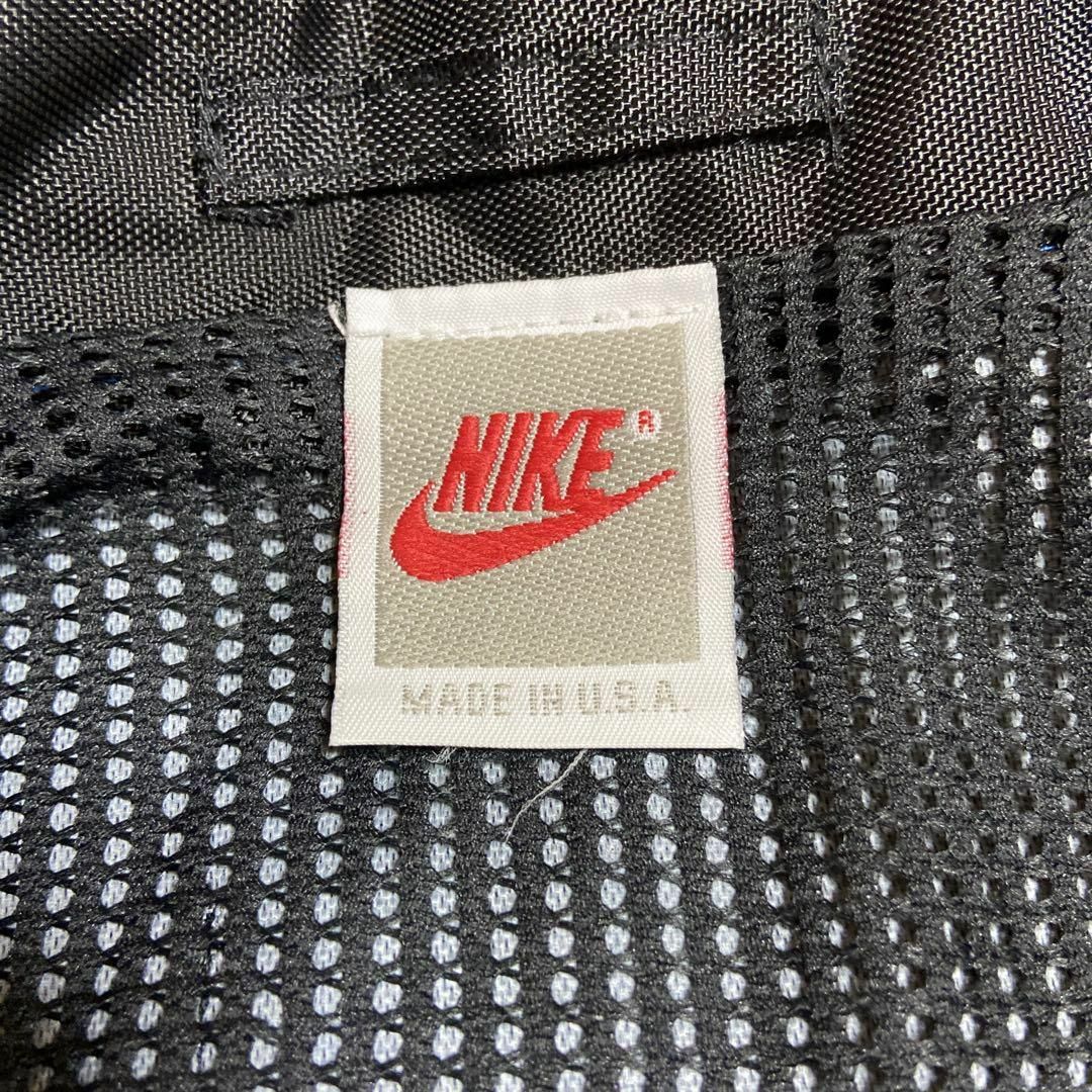 NIKE(ナイキ)の【背面ビッグ刺繍ロゴ、usa製】NIKEナイロンジャケット古着ブラック90s メンズのジャケット/アウター(ナイロンジャケット)の商品写真