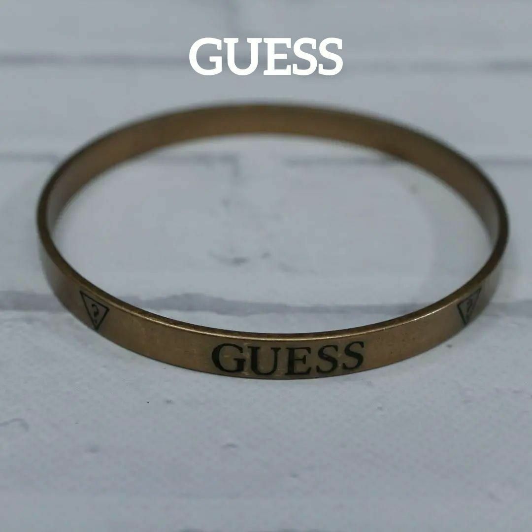 GUESS(ゲス)の【匿名配送】GUESS ゲス バングル ブレスレット ゴールド ロゴ レディースのアクセサリー(ブレスレット/バングル)の商品写真