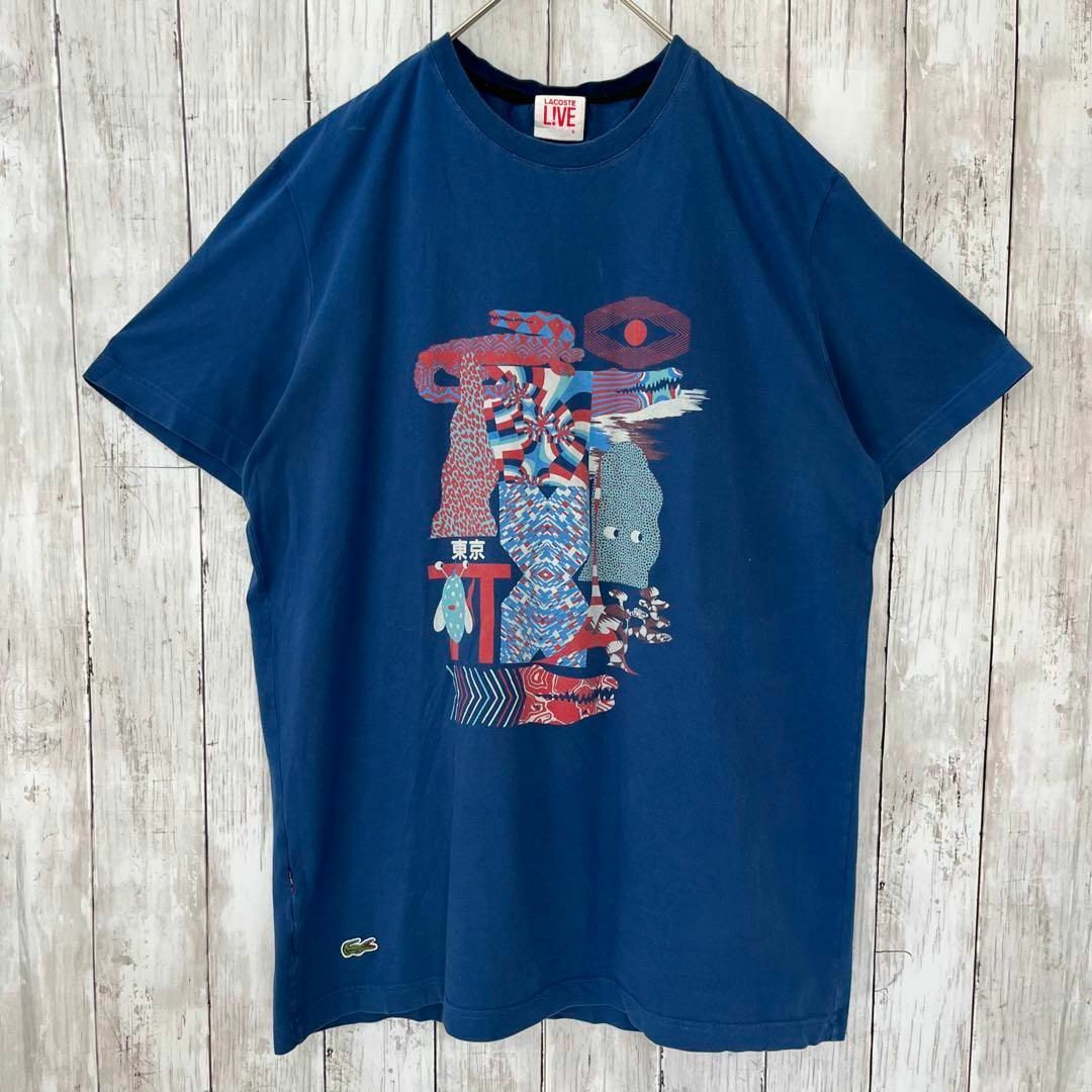 LACOSTE(ラコステ)のメンズ古着　LACOSTEラコステ　プリントTシャツ　サイズL ブルー　ワニ刺繍 メンズのトップス(Tシャツ/カットソー(半袖/袖なし))の商品写真