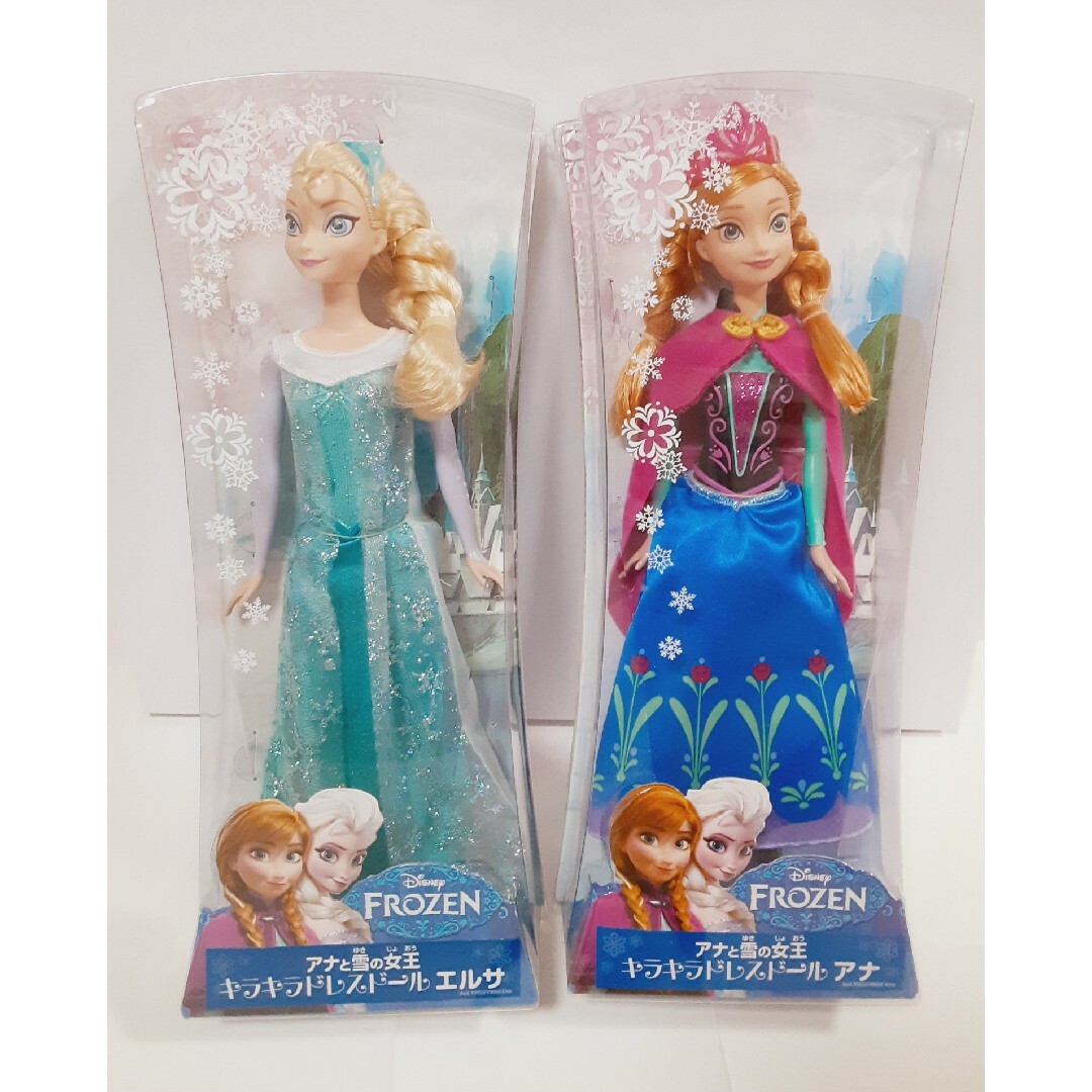 アナと雪の女王(アナトユキノジョオウ)の新品　アナと雪の女王　キラキラドレスドール　アナとエルサ　２点セット エンタメ/ホビーのおもちゃ/ぬいぐるみ(キャラクターグッズ)の商品写真