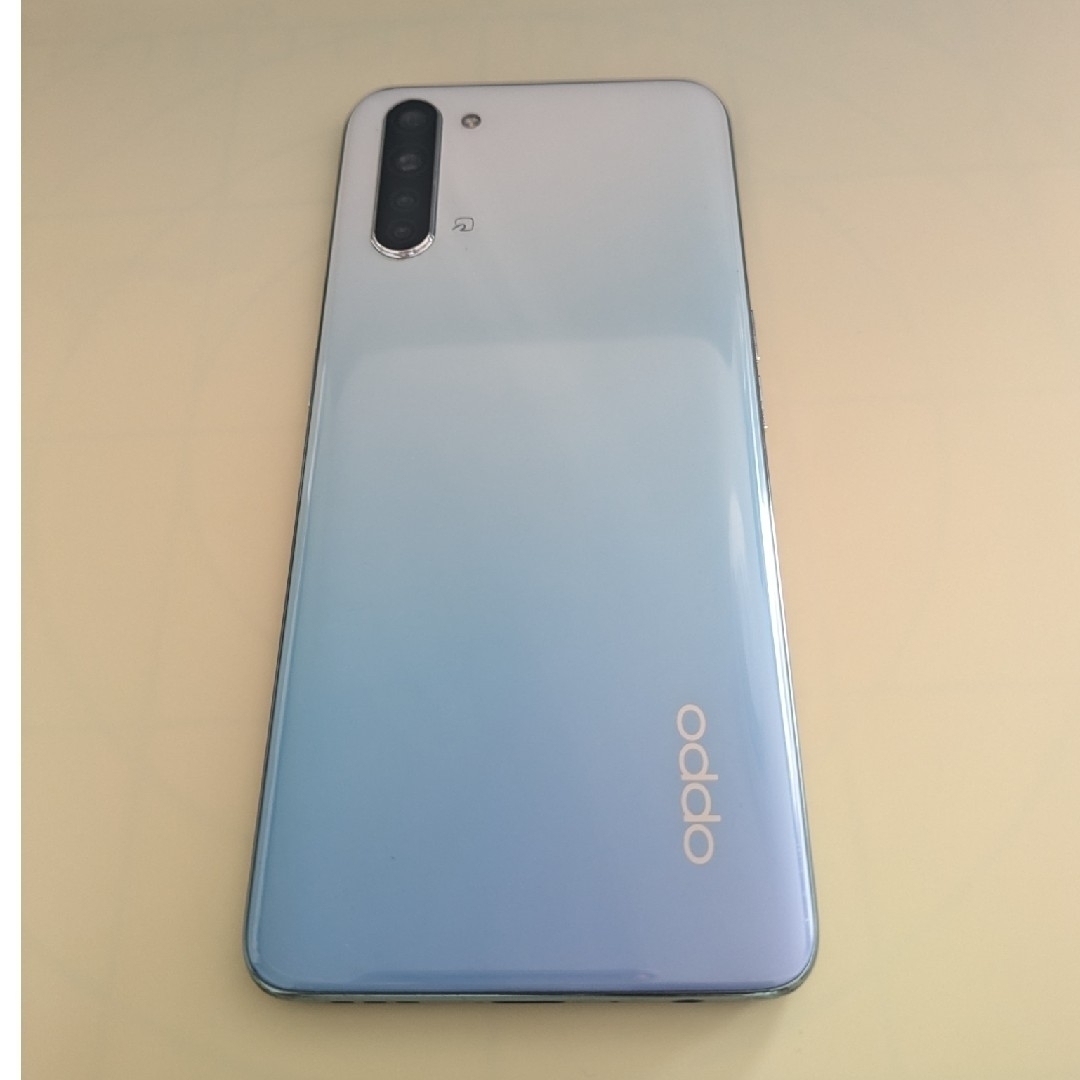 OPPO(オッポ)のOPPO オッポ Reno3 A 128GB ホワイト A002OP スマホ/家電/カメラのスマートフォン/携帯電話(スマートフォン本体)の商品写真