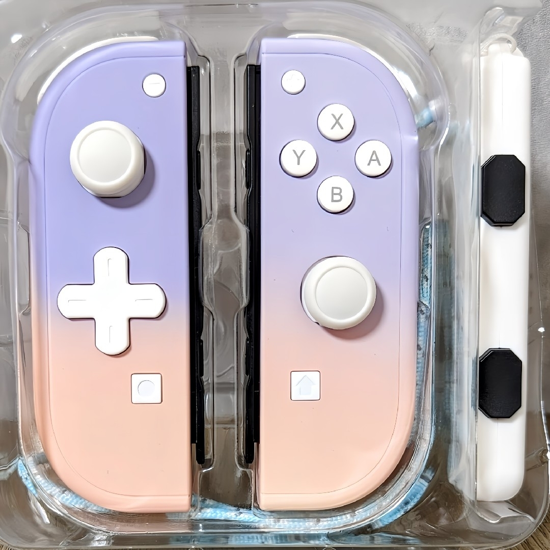 Nintendo Switch(ニンテンドースイッチ)の【新品】ジョイコン パステルカラー 白ボタン ラベンダー ピンク エンタメ/ホビーのゲームソフト/ゲーム機本体(家庭用ゲーム機本体)の商品写真