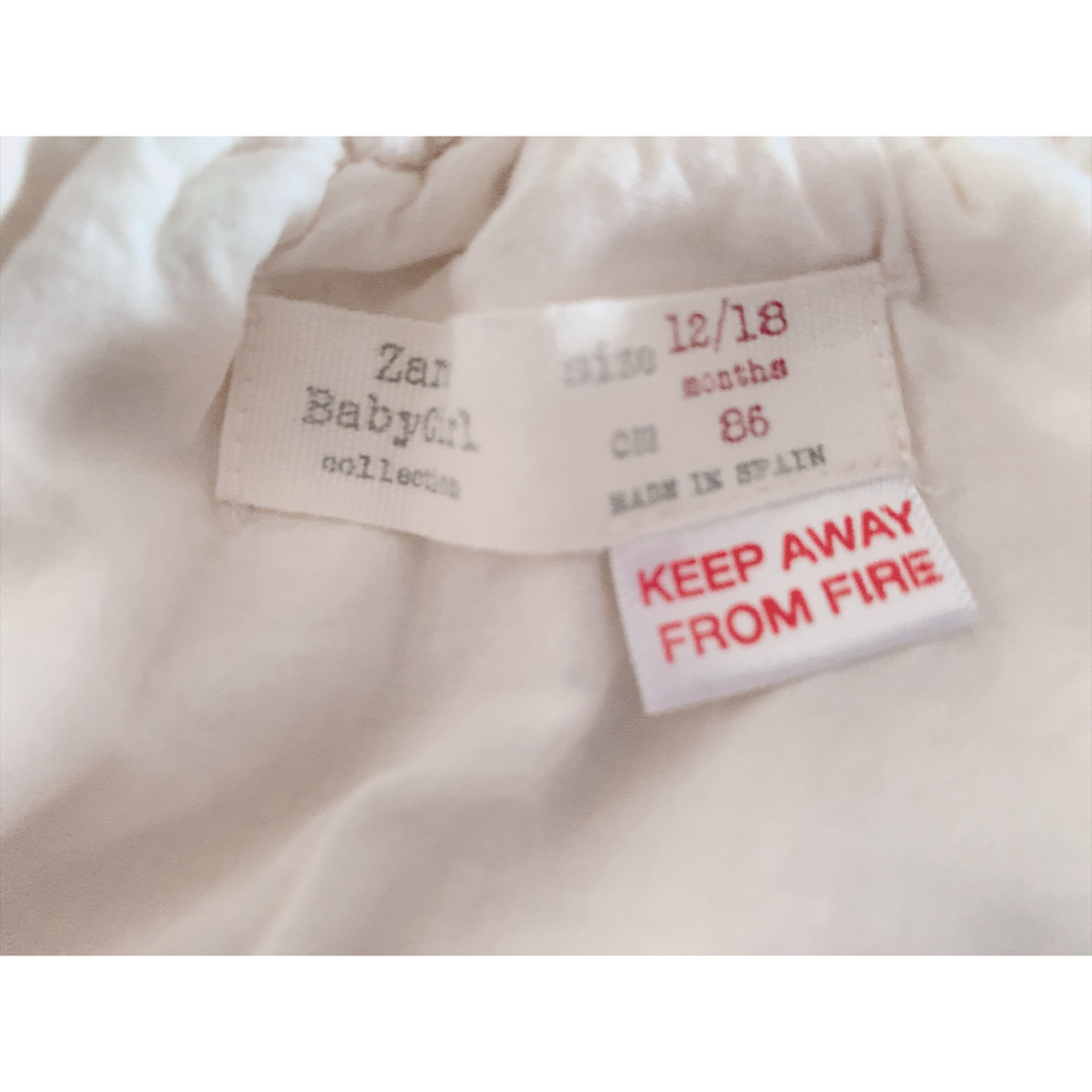 ZARA KIDS(ザラキッズ)のZARAベビー　エプロン キッズ/ベビー/マタニティのベビー服(~85cm)(シャツ/カットソー)の商品写真