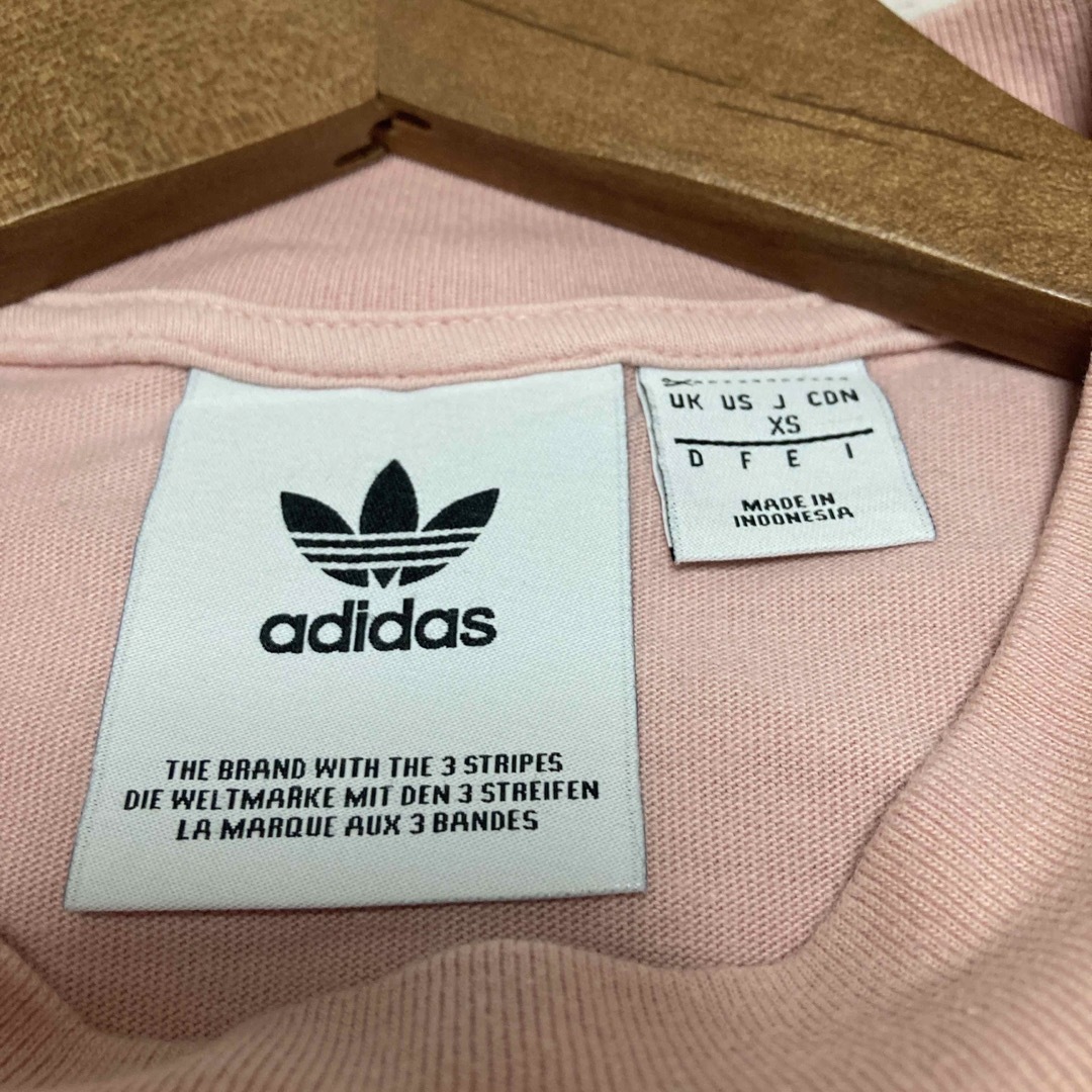 adidas(アディダス)のadidas Tシャツ　ペールピンク　ユニセックス　半袖 レディースのトップス(Tシャツ(半袖/袖なし))の商品写真