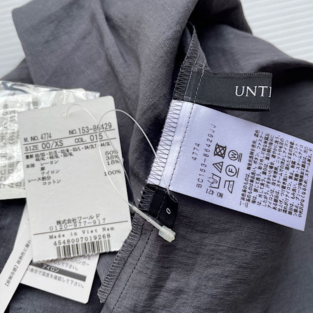 UNTITLED(アンタイトル)の新品　UNTITLED ブラウス　リネン混　袖コンシャス　グレー　麻　0  レディースのトップス(シャツ/ブラウス(半袖/袖なし))の商品写真