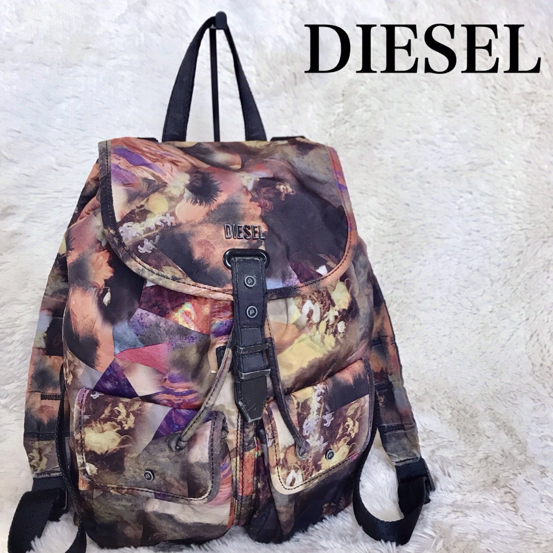 DIESEL(ディーゼル)のDIESEL ディーゼル マルチカラー バックパック リュックサック ロゴ金具 レディースのバッグ(リュック/バックパック)の商品写真