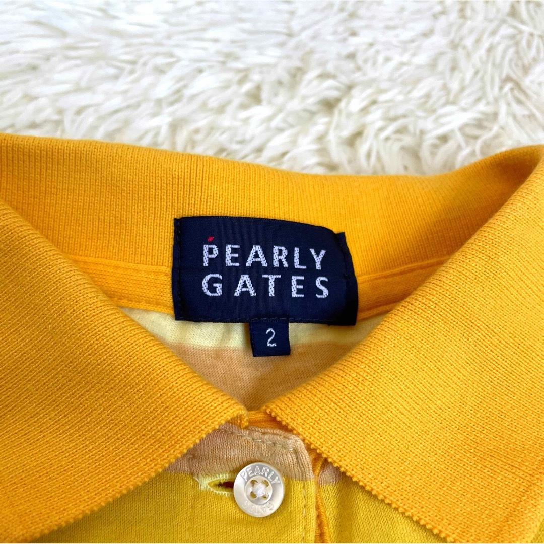 PEARLY GATES(パーリーゲイツ)のパーリーゲイツ　ボーダーTEE　ポロシャツ　黄　茶　ロゴ　バックロゴ　2 スポーツ/アウトドアのゴルフ(ウエア)の商品写真