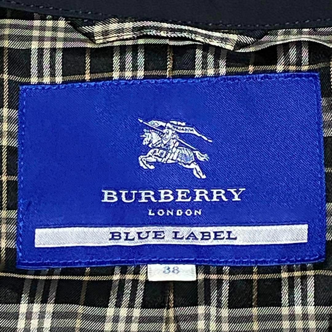 BURBERRY BLUE LABEL(バーバリーブルーレーベル)のバーバリーブルーレーベル　コート　ダークグレー　38（M相当）　金ボタン　フード レディースのジャケット/アウター(トレンチコート)の商品写真