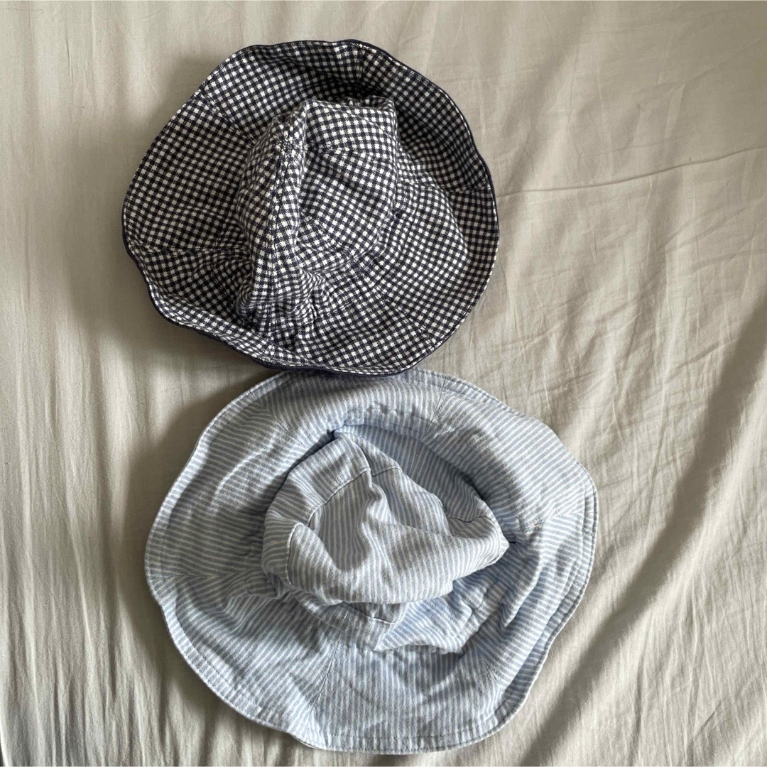 UNIQLO(ユニクロ)のユニクロ　綿100% 帽子　Sサイズ&Mサイズ　2枚セット キッズ/ベビー/マタニティのベビー服(~85cm)(その他)の商品写真