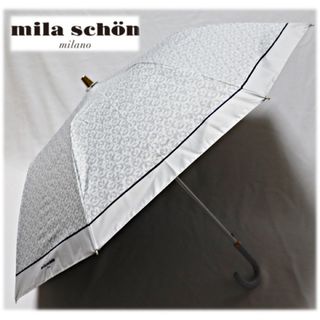 ミラショーン(mila schon)の《ミラ・ショーン》新品 1級遮光生地 ロゴ総柄 晴雨兼用折りたたみ傘 ジャンプ傘(傘)