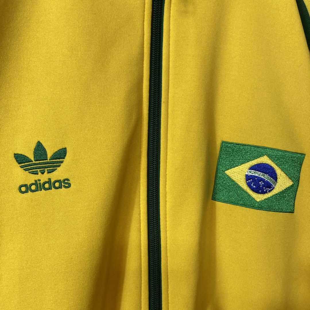adidas(アディダス)の【好配色、刺繍ロゴ】adidasトラックジャケット古着フロッキー緑ブラジル長袖 メンズのトップス(ジャージ)の商品写真