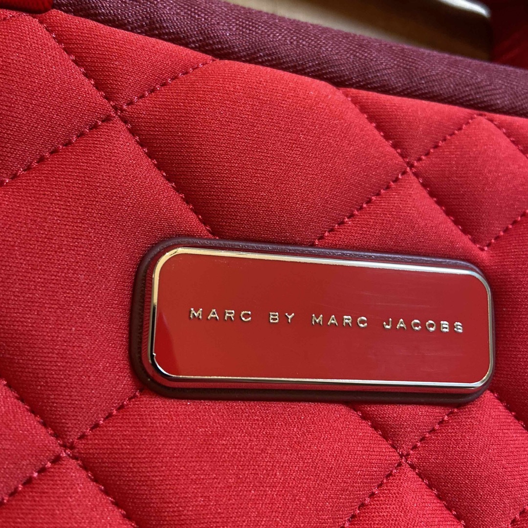 MARC BY MARC JACOBS(マークバイマークジェイコブス)の中古美品   MARC BY MARC JACOBS  パソコンバッグ　赤系 レディースのバッグ(その他)の商品写真