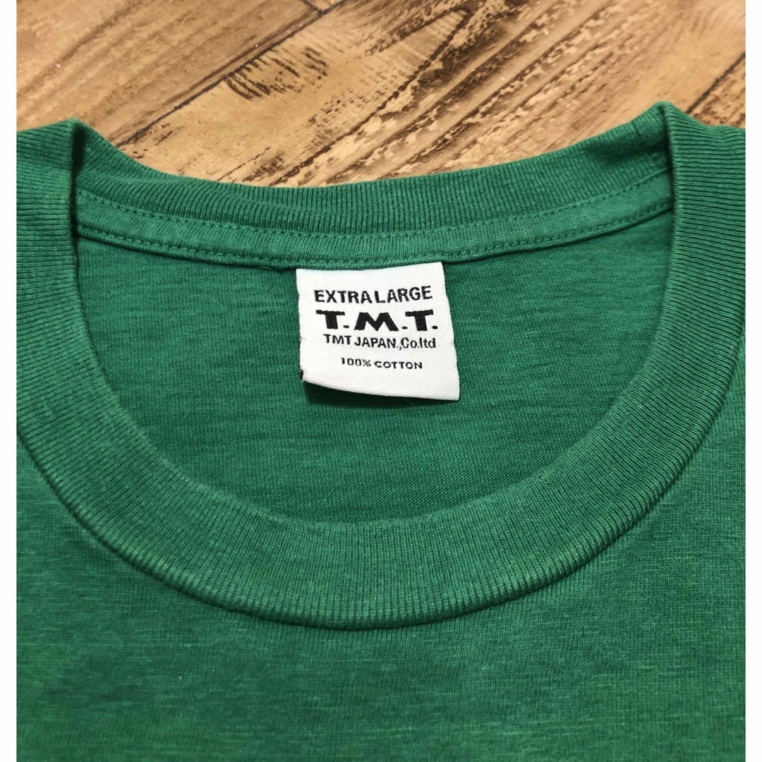 TMT(ティーエムティー)のTMT BIGHOLIDAY  ティーエムティーTEE メンズのトップス(Tシャツ/カットソー(半袖/袖なし))の商品写真
